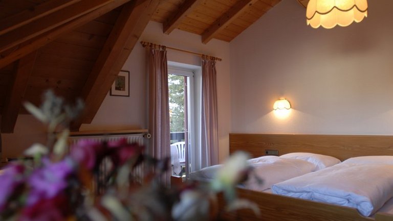 Dachzimmer in unserem Hotel auf dem Ritten in Südtirol